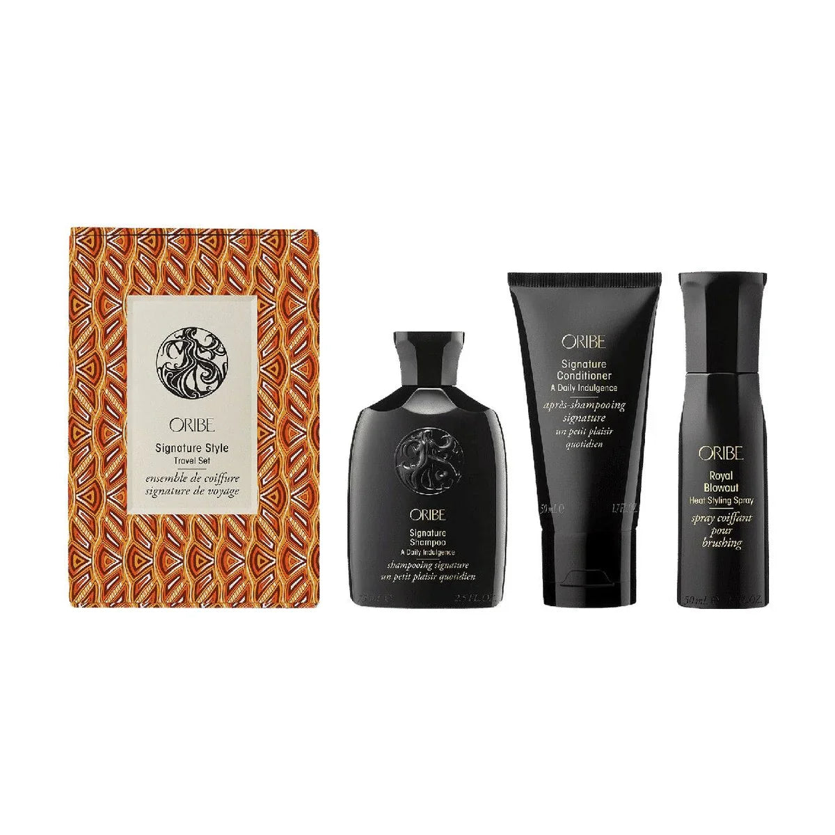 Oribe Signature Style travel set with patterned box and three haircare bottles