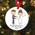 Round white personalized Christmas ornament with couple illustration and red hanging ribbon