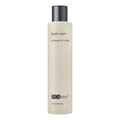 Facial wash bottle PCA Skin, tall beige plastic with black pump cap