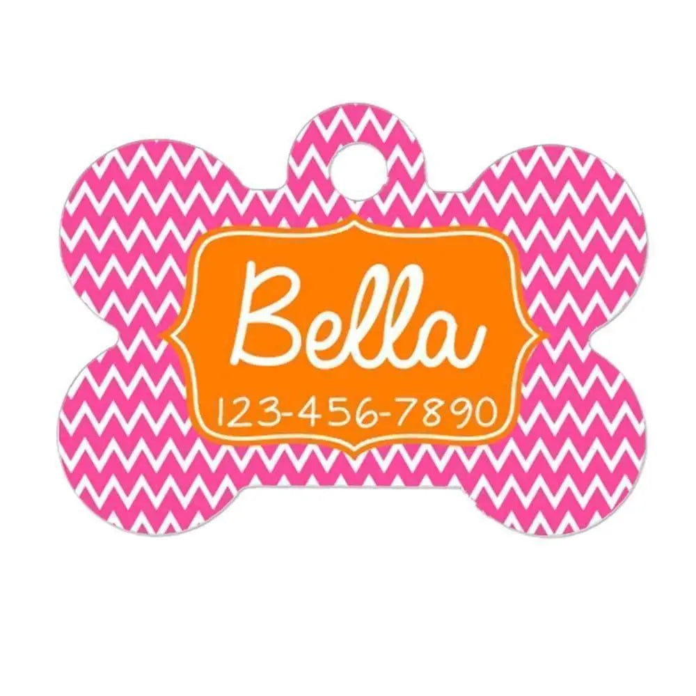 Personalized pink and orange chevron dog bone ID tag with name Bella and phone number