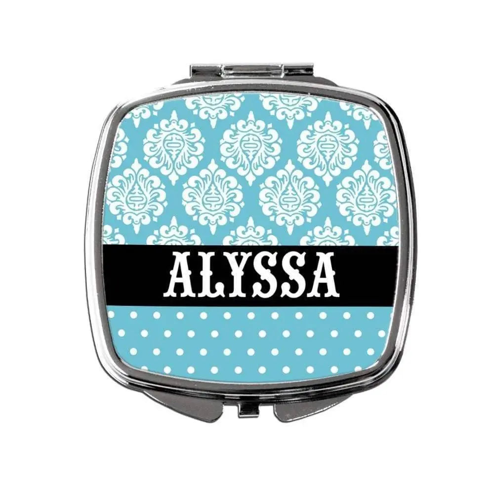 Turquoise compact mirror with ornate white damask pattern and centered name ALYSSA