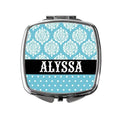 Turquoise compact mirror with ornate white damask pattern and centered name ALYSSA