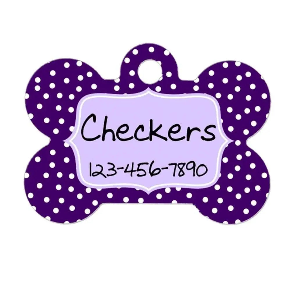 Purple polka-dot dog bone ID tag with circular hole and custom name plate
