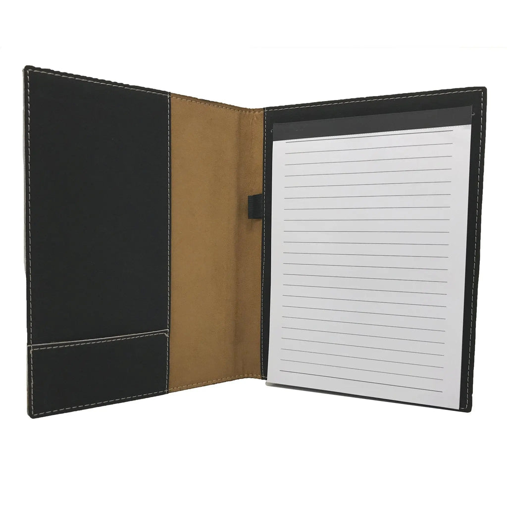 Open leather portfolio with notepad, lined paper page; black covers and tan inside