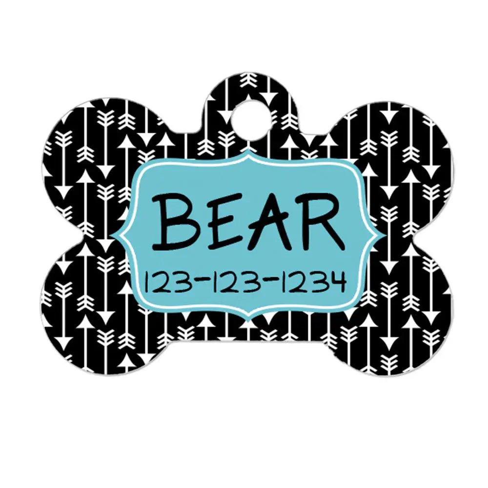 Personalized pet ID tag with black bone shape and turquoise nameplate reading BEAR