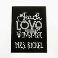 Personalized teacher notepad holder, black cover with white “Teach Love Inspire” text