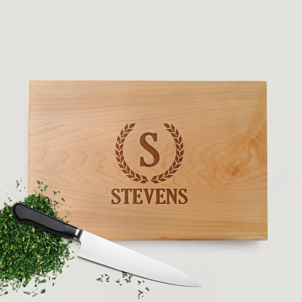 Personalized engraved maple cutting board with monogram and STEVENS lettering