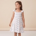 Girls' smocked vintage dress in light pink with blue hen print, ruffled cap sleeves
