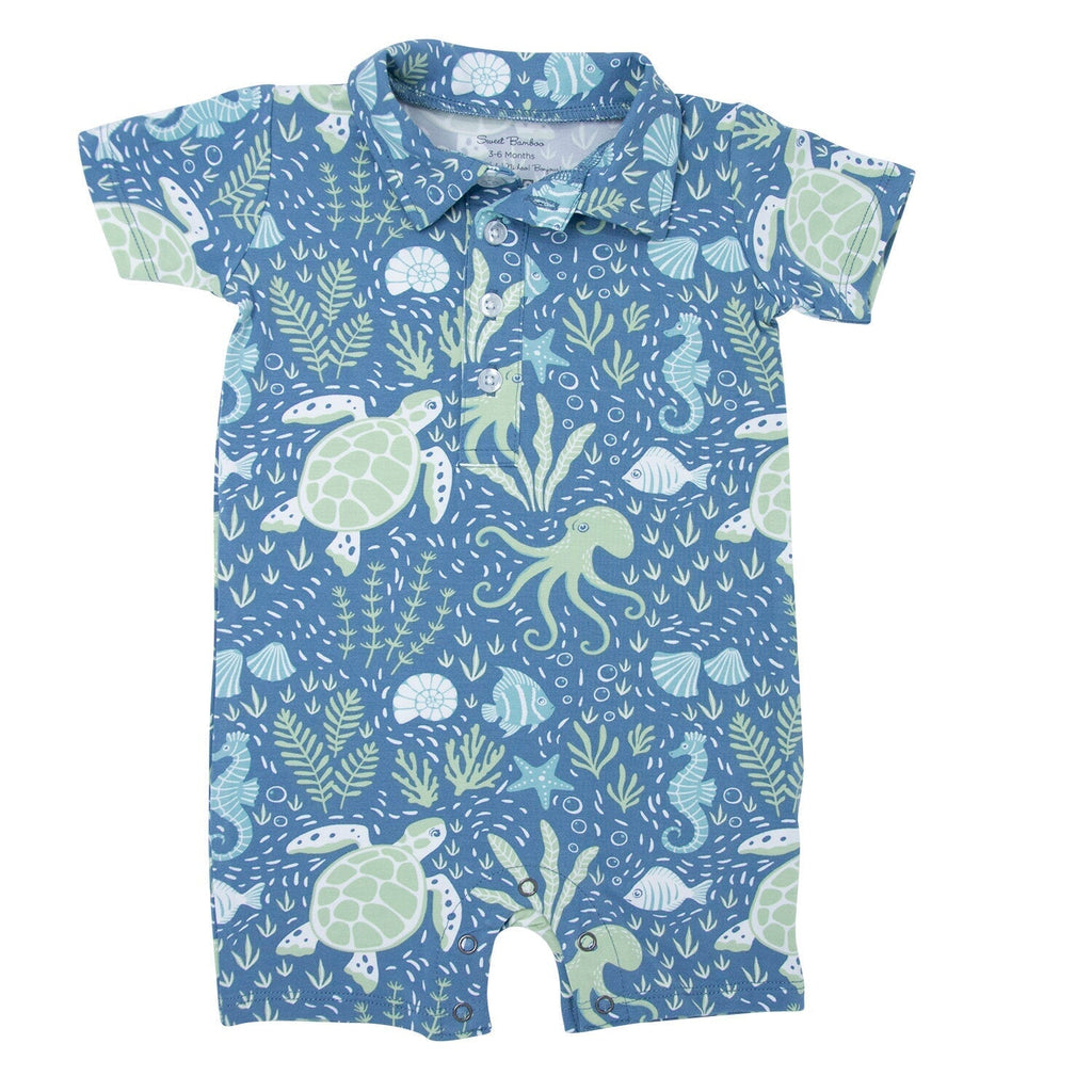 Blue sea-life print polo romper with button collar, short sleeves, snap legs