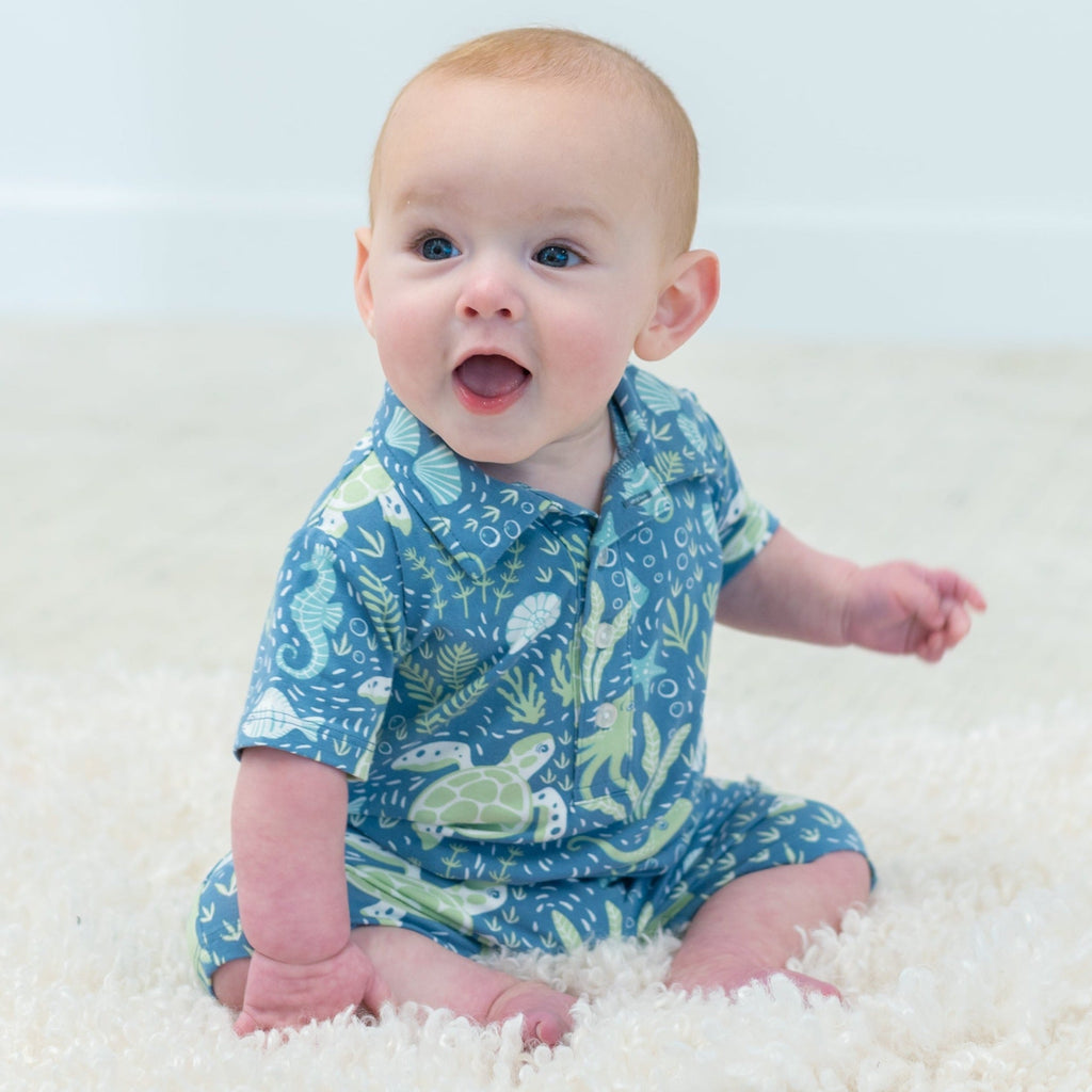 Boy polo romper in blue sea-life print, collar and short sleeves