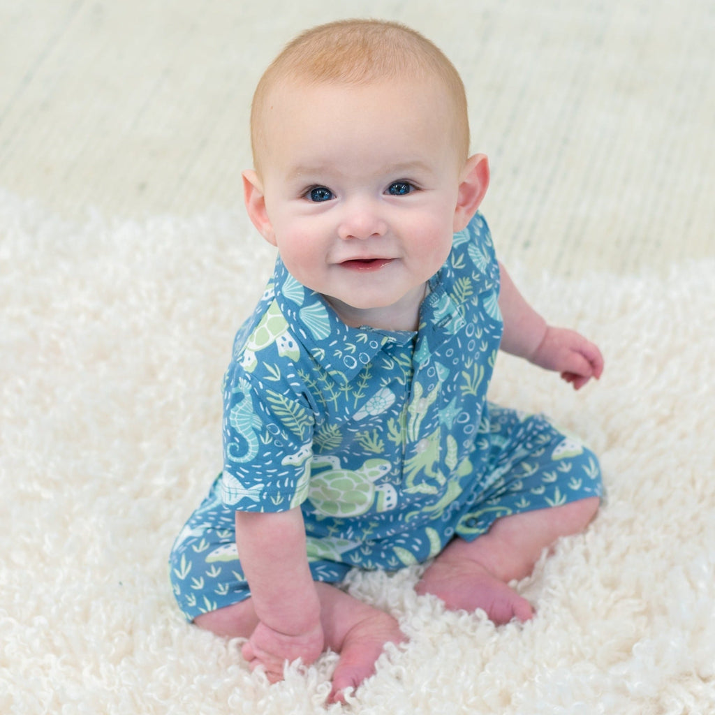 Boy polo romper in blue sea-life print, collar and short sleeves
