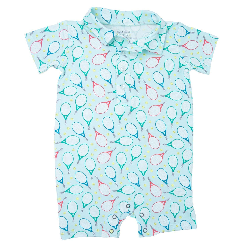 Turquoise polo romper with tennis racket print, short sleeves and button placket.