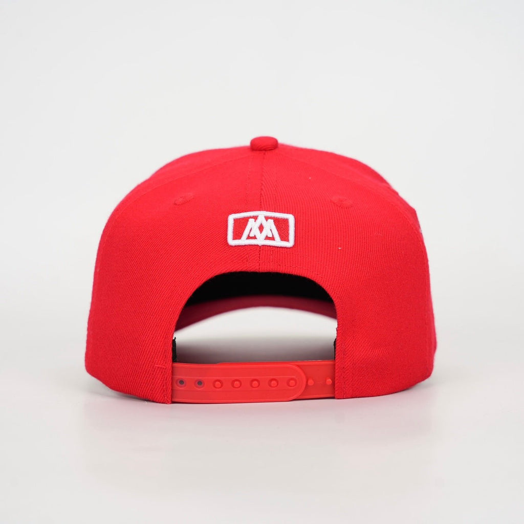Red snapback cap back view with small white square logo and adjustable strap