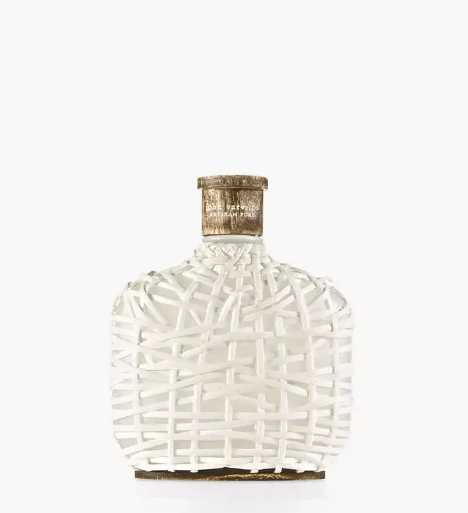 Perfume bottle with white lattice-pattern glass and gold-toned cap