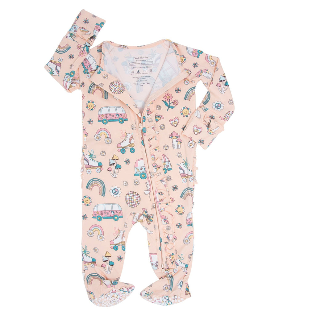 Light pink baby footie with long sleeves, front zipper, and allover skate print