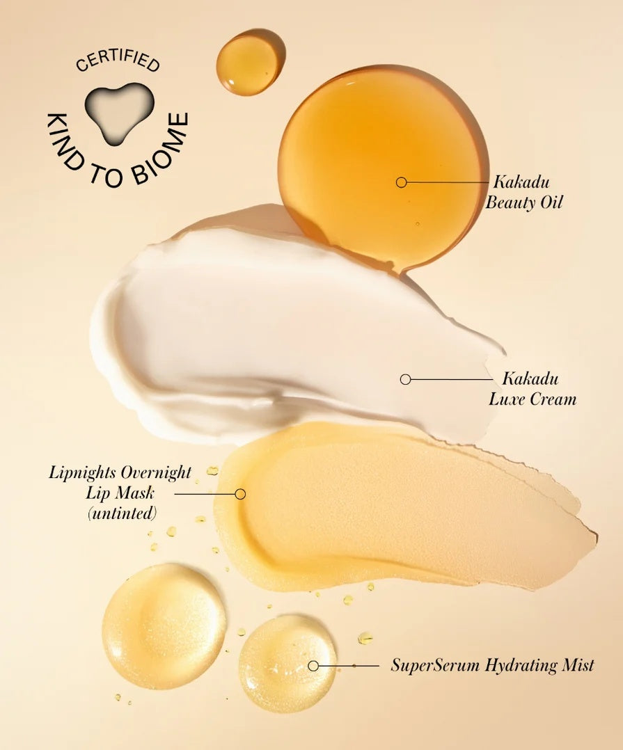 Skincare kit set with oil, luxe cream, and hydrating mist shown with drops