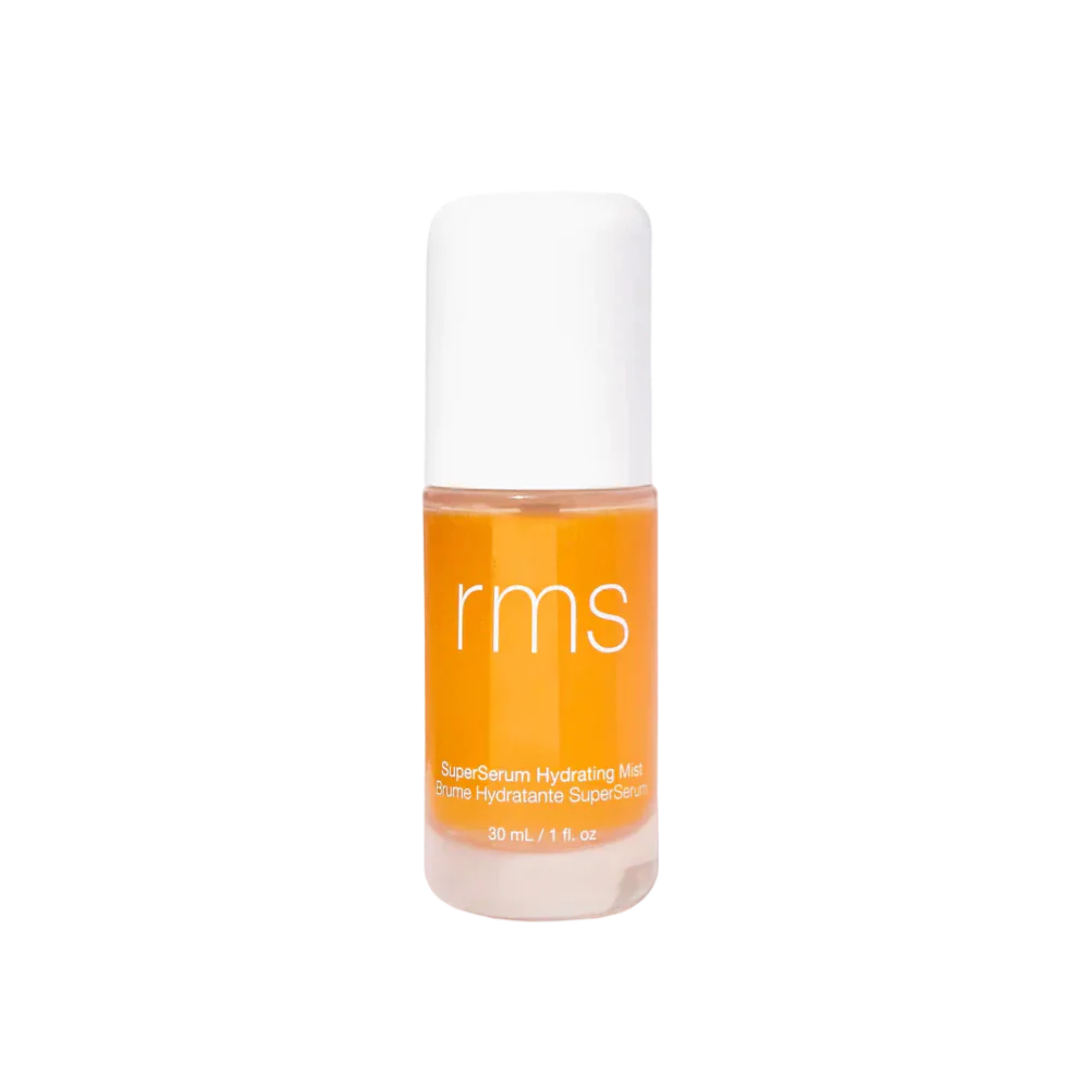 Hydrating facial mist bottle with white cap and orange RMS label