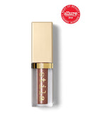 Glitter & Glow liquid eye shadow, rose-gold shimmer in a tube
