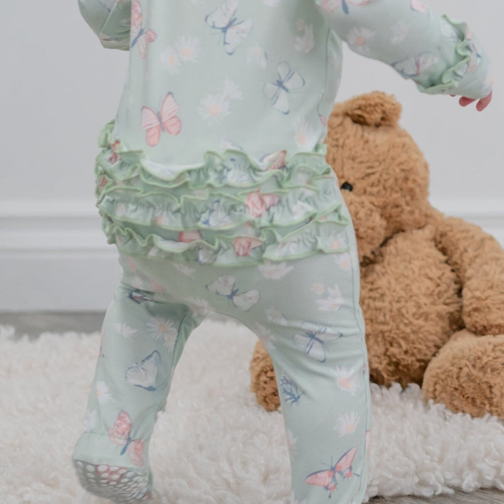Mint baby footie with ruffle hem and butterfly-and-daisy print, long sleeve