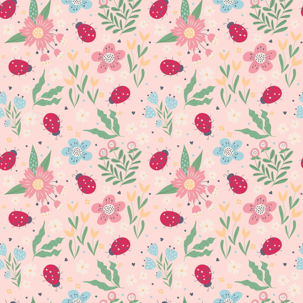 Kids romper fabric swatch with pink flowers, ladybugs, and green leaf pattern