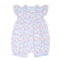 Girls floral ruffle romper with flutter sleeves, gathered yoke, and short legs
