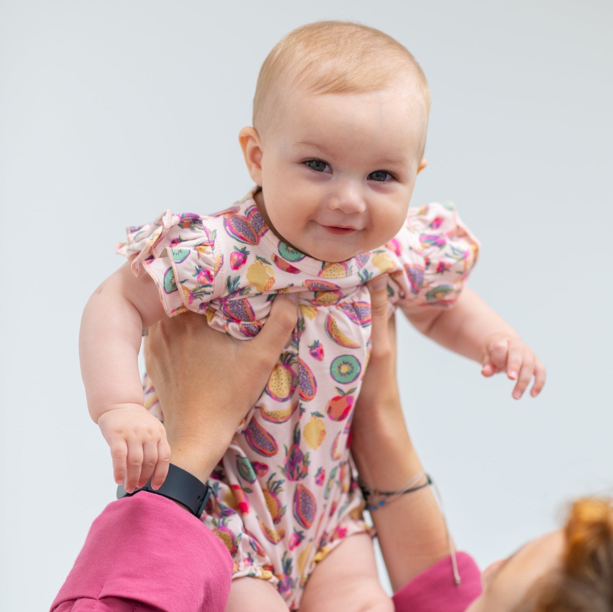 Girls’ fruit ruffle romper, gathered neckline and flutter sleeves