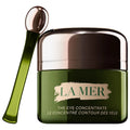 Eye concentrate cream jar, dark green with La Mer label and curved applicator scoop