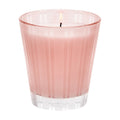 Rosewater candle jar in pink glass with ribbed pattern and NEST logo on base