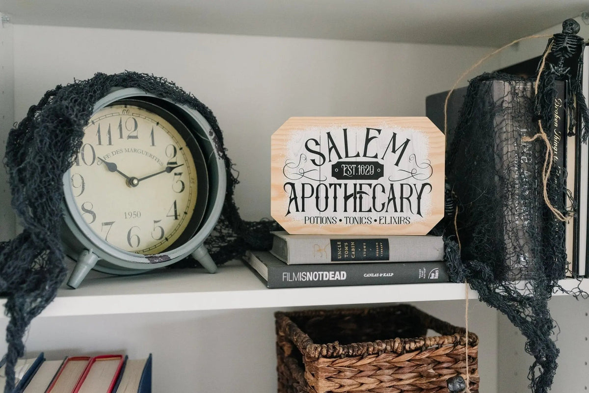 Octagonal wood block sign, 'SALEM APOTHECARY' printed in dark ink