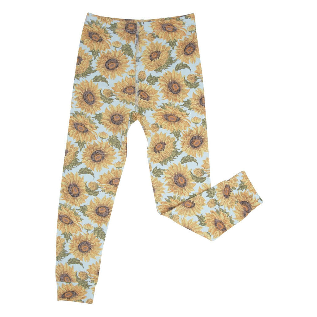 Kids pajama pants with yellow sunflower print and cuffed ankle hems
