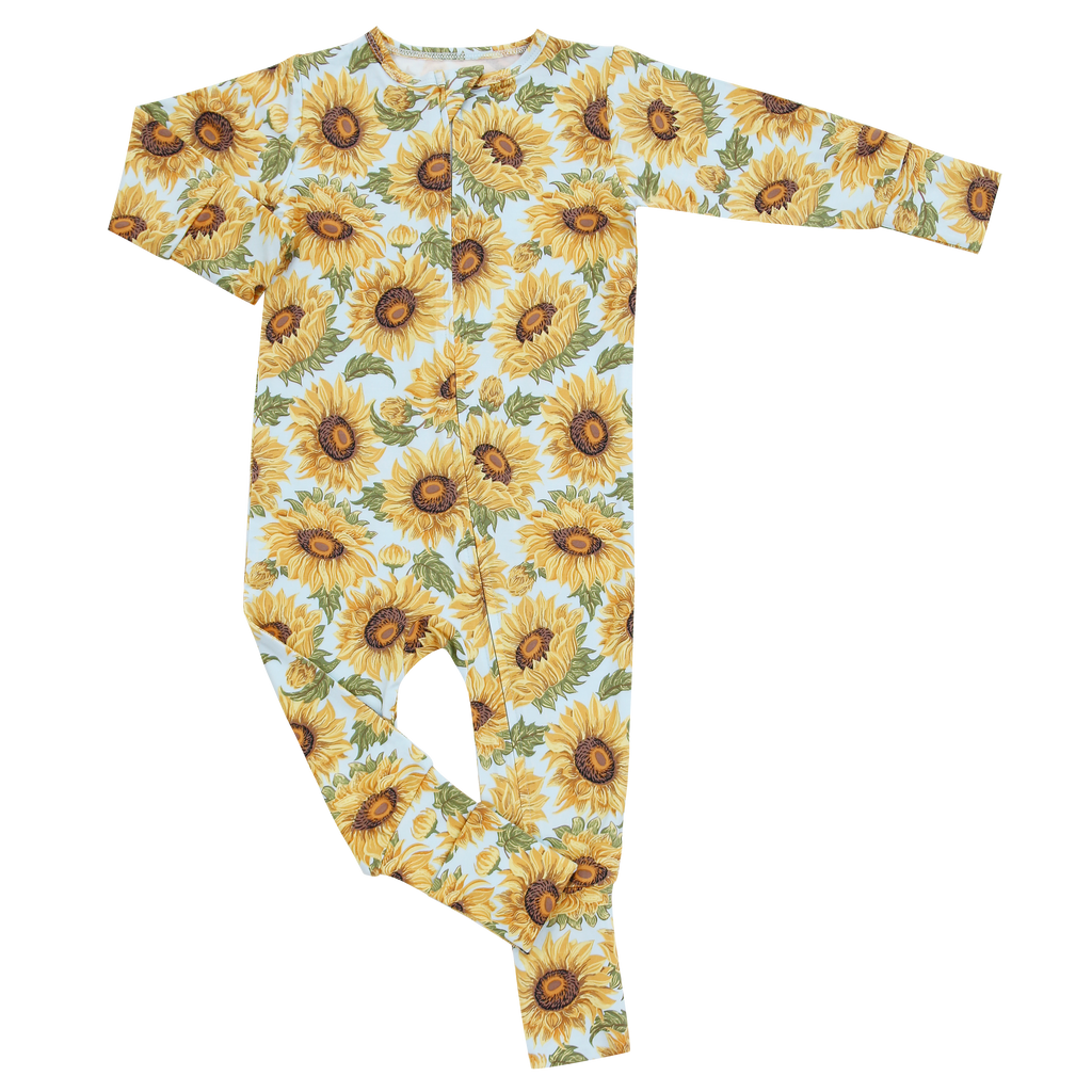 Light blue sunflower-print long-sleeve footed romper, full-body front view