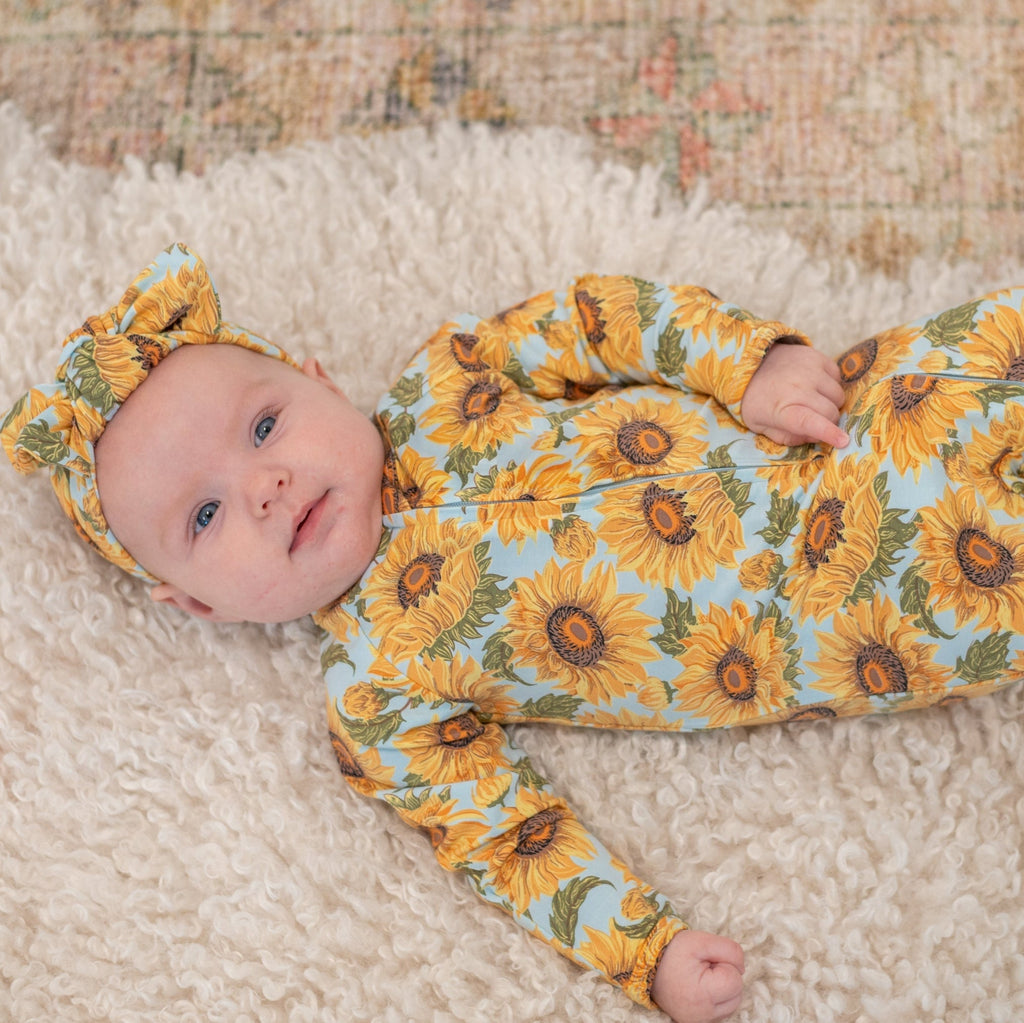 Sunflower print zipper footie for baby, long sleeves, orange-yellow floral pattern