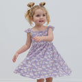 Girls smocked vintage dress in lavender with rainbow-cloud print and flutter straps