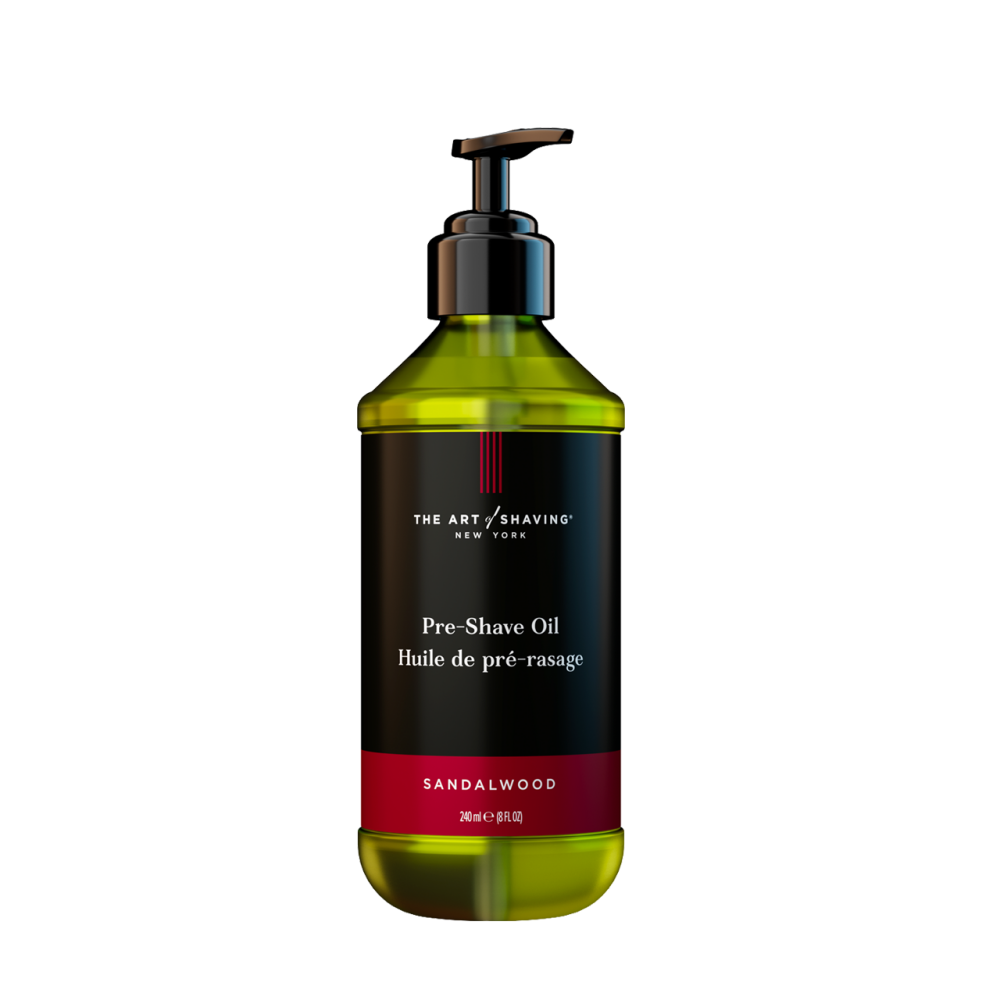 Pre-shave oil pump bottle with amber liquid and sandalwood label