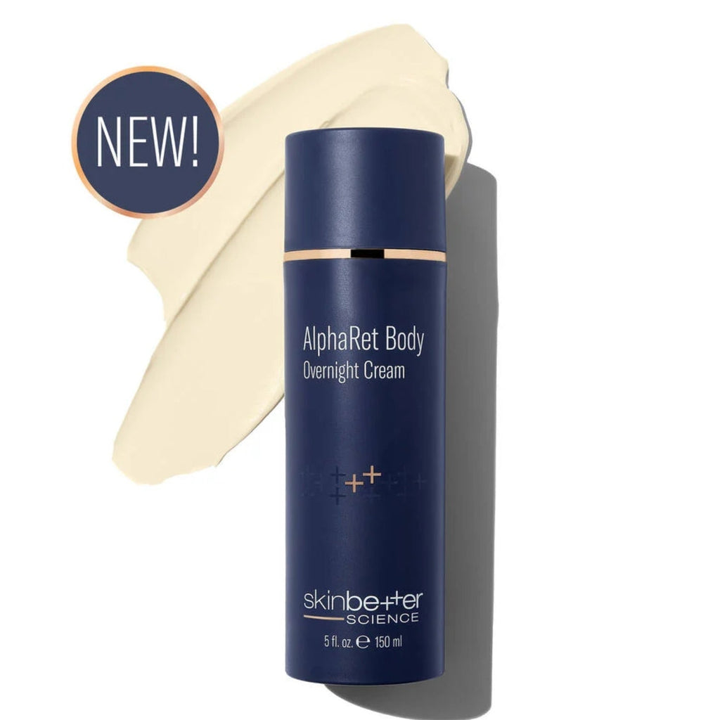 Dark blue overnight body cream bottle with off-white cream smear behind it