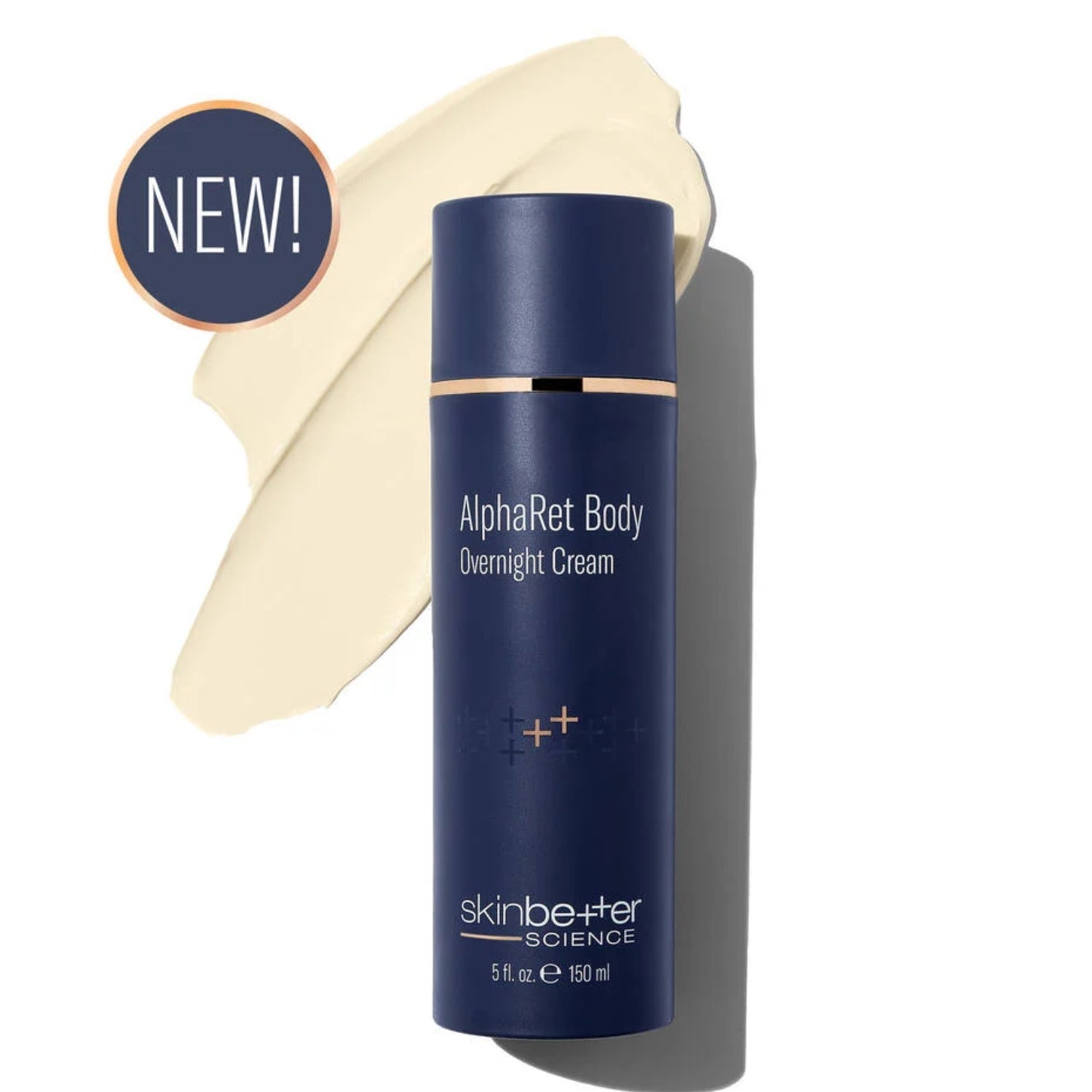 Dark blue overnight body cream bottle with off-white cream smear behind it