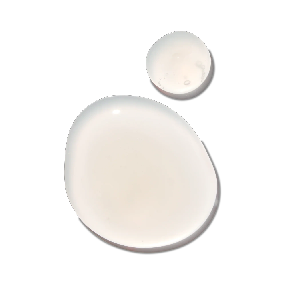 Frizz-fighting treatment mask creamy white formula, two dollops