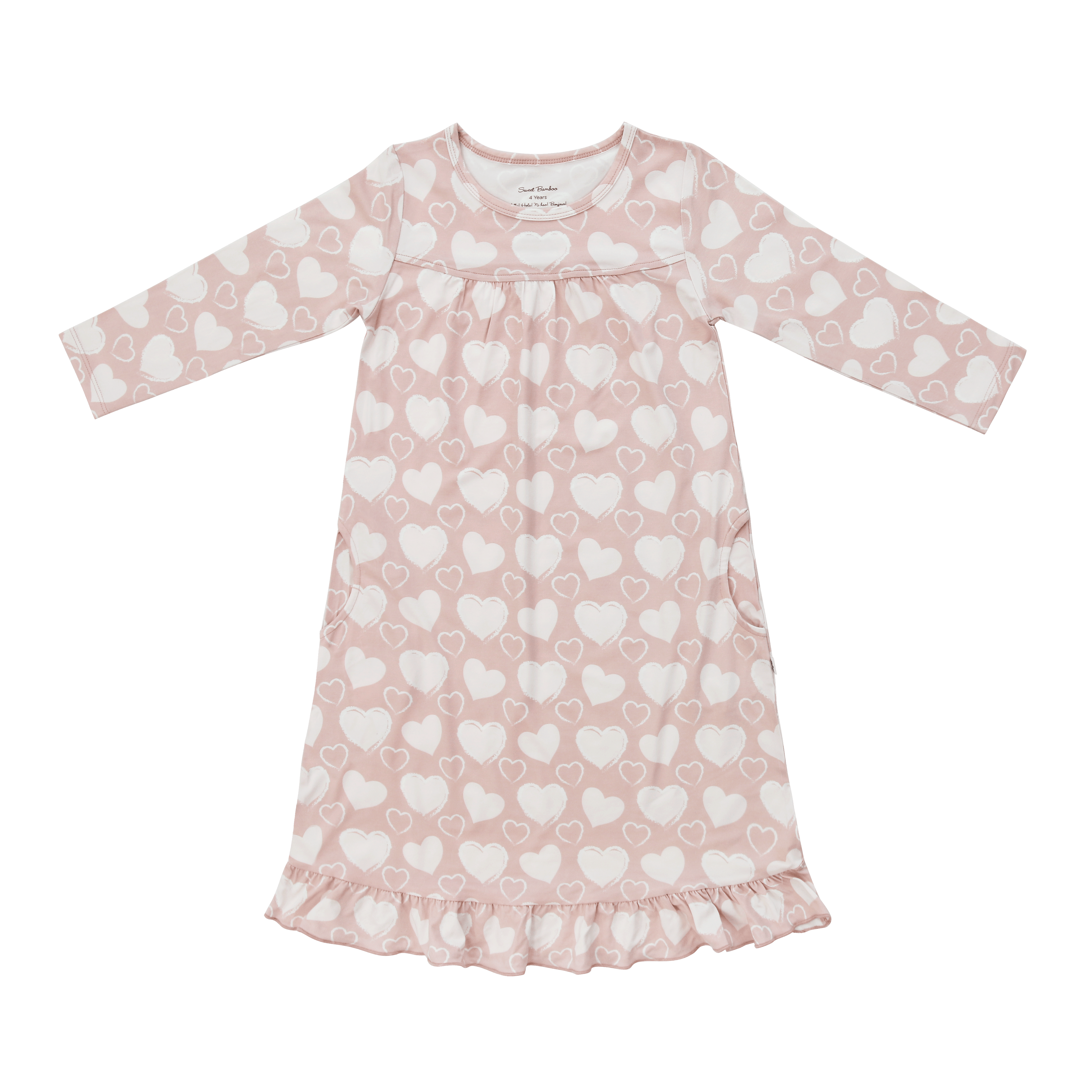 Girls long-sleeve pink dress with allover white hearts and ruffled hem