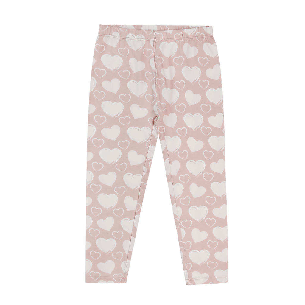Girls classic leggings in light pink with allover white heart print, full length