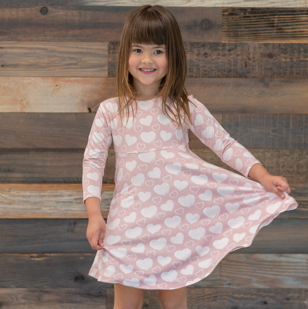 Girl swirly dress, pink with white hearts, long sleeves and flared skirt