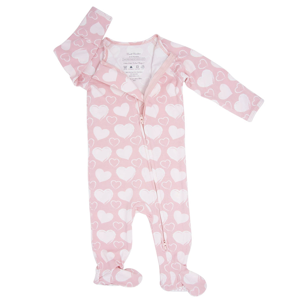 Pink heart-pattern zipper footie with long sleeves and front zip