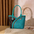 Turquoise teal embroidered tote bag with patterned trim, dual handles and zipper top.