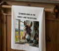 “Stubborn runs in the Family—and the Kitchen” Sassy Donkey themed tea towel.