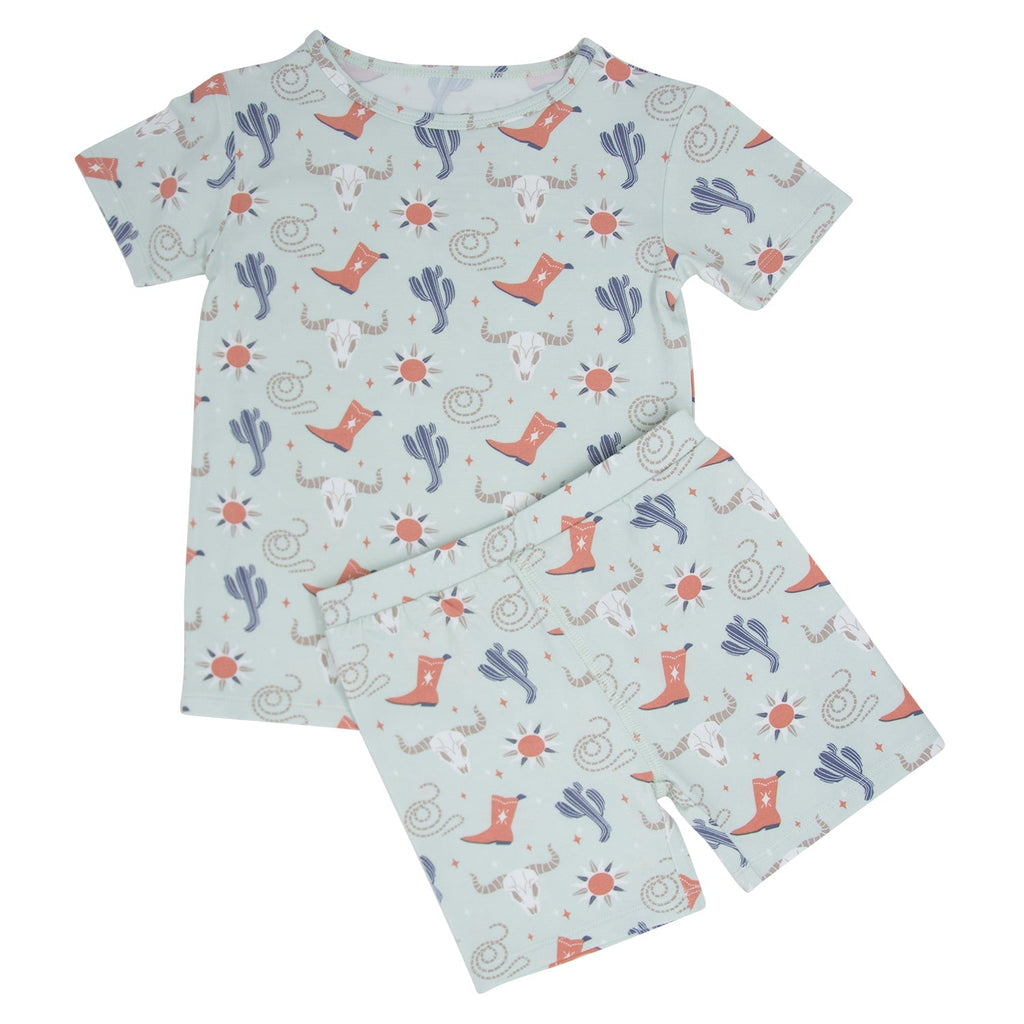 Boys western pajama set, light blue shirt and shorts with cowboy boot and cactus print