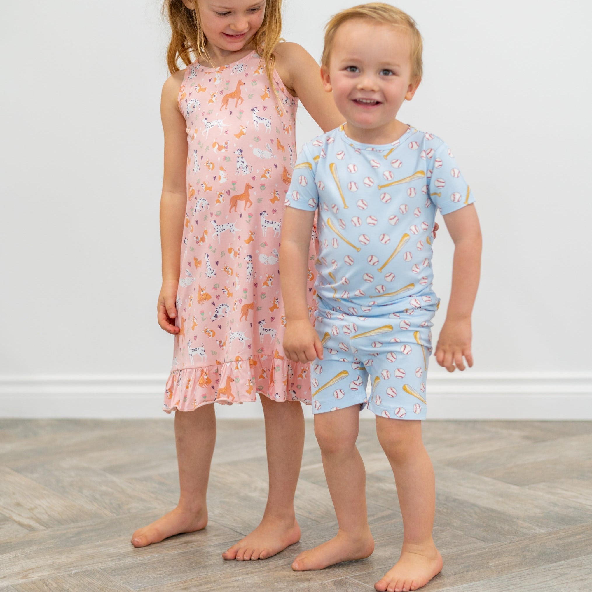 Boys' light-blue baseball pajama set with all-over bat and ball print, short-sleeve and shorts