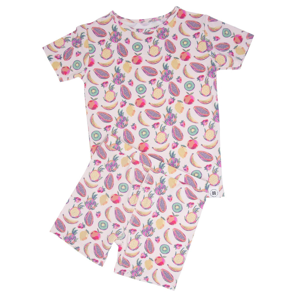 Girls’ tropical fruit pajama set with short-sleeve top and matching shorts