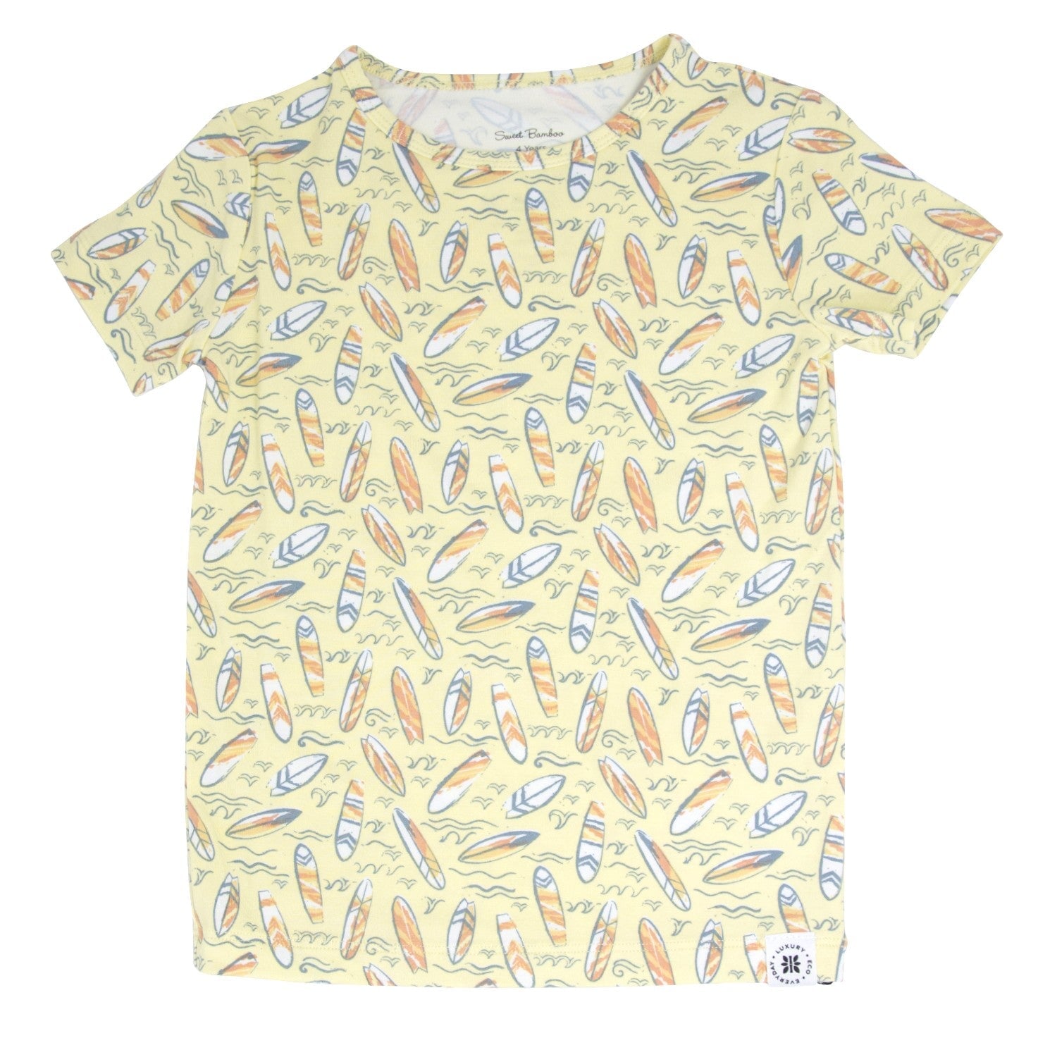 Big kid short-sleeve pajama top with surfboard print, yellow base and multicolor