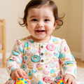 Girls' ruffle gown with colorful cupcake and donut print, button front, long sleeves