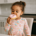 Girls’ swirly dress with long sleeves and pastel cupcake and ice cream print