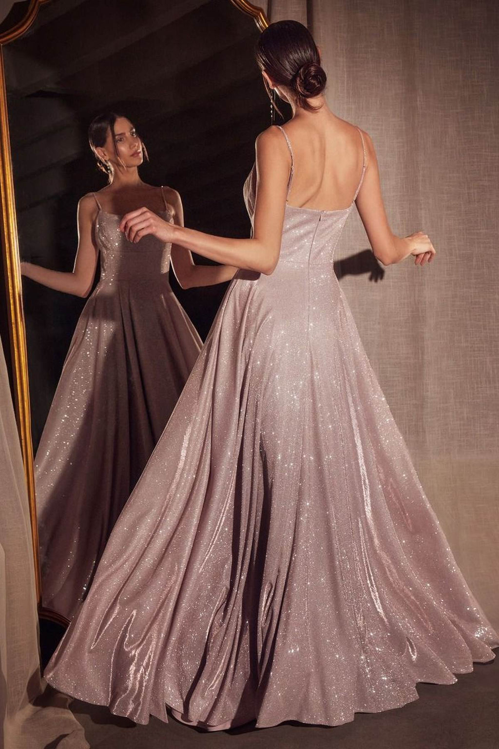 Champagne glitter A-line gown with open-back style and spaghetti straps